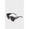 Black sunglasses with rhinestones on the temples
