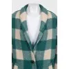 Green coat with a checkered print
