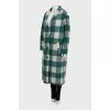Green coat with a checkered print