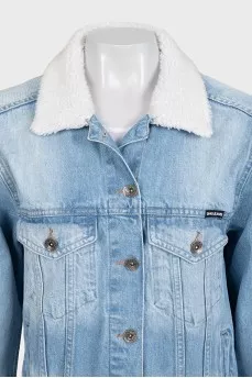 Denim jacket with a white collar