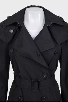 Black trench coat with a straight belt