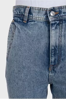 Light blue skinny jeans with a button