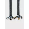 Blue textile belt with pom-poms