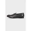 Men's brown leather loafers with embossing