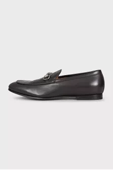Men's brown leather loafers with embossing