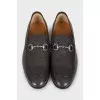 Men's brown leather loafers with embossing