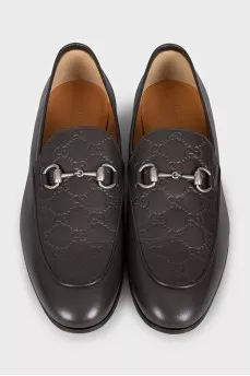 Men's brown leather loafers with embossing