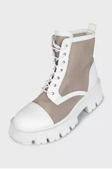 White boots made of combined material