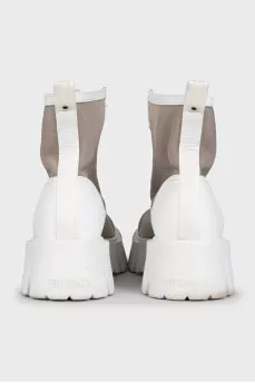 White boots made of combined material