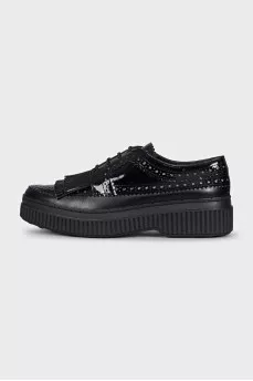 Black leather brogues