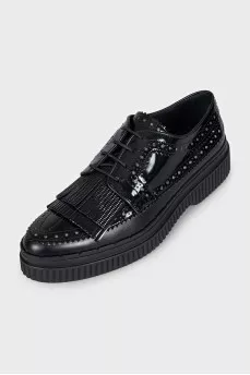 Black leather brogues