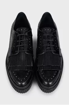 Black leather brogues