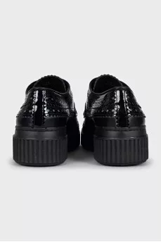 Black leather brogues