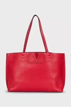 Red leather tote bag with logo