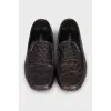 Men's brown leather loafers with logo