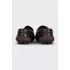 Men's brown leather loafers with logo