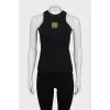 Black top with gold embroidery