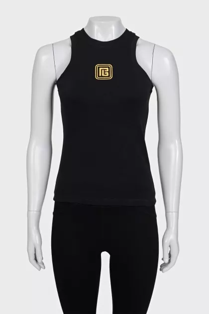 Black top with gold embroidery