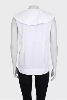 White sleeveless blouse with tag