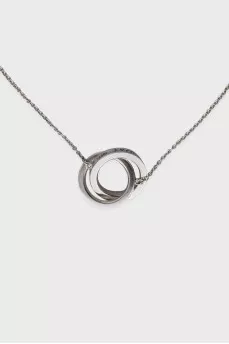 Silver necklace with a pendant of two rings