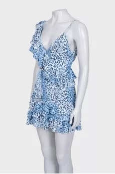 Blue sundress with ruffles in animal print