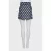 Blue skirt with bow print