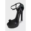 Black leather high-heeled sandals