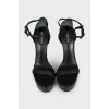 Black leather high-heeled sandals