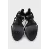 Black leather high-heeled sandals
