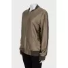 Bomber jacket with a zipper and elastic band