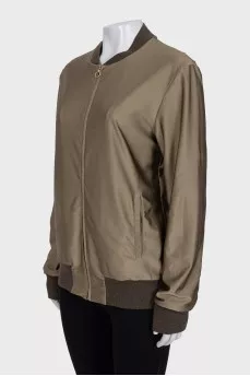 Bomber jacket with a zipper and elastic band
