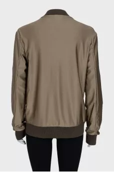 Bomber jacket with a zipper and elastic band