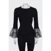 Black jumper with tulle sleeves