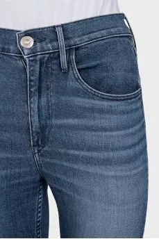 Blue jeans with fringe on the legs