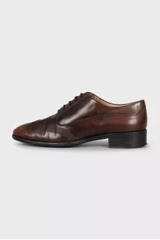 Brown brogues with perforations