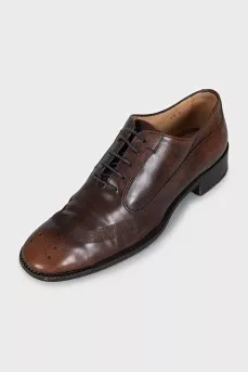 Brown brogues with perforations