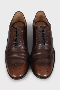 Brown brogues with perforations