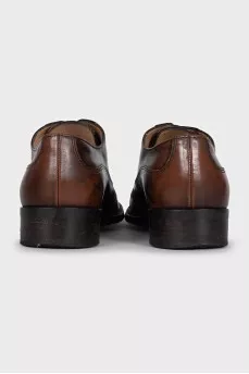 Brown brogues with perforations