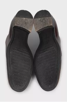 Brown brogues with perforations