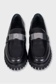 Black loafers with logo