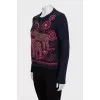 Blue jumper with embroidery