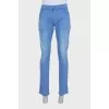 Men's light blue jeans with embroidery