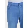 Men's light blue jeans with embroidery