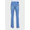 Men's light blue jeans with embroidery