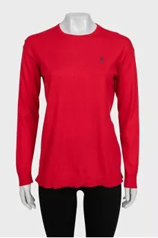 Red jumper with embroidered logo