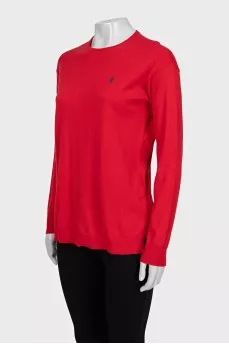 Red jumper with embroidered logo
