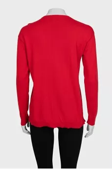 Red jumper with embroidered logo