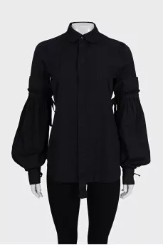 Black shirt with ties on the sleeves
