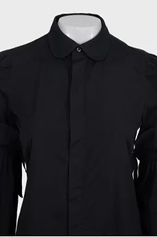 Black shirt with ties on the sleeves