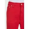 Men's jeans with branded buttons